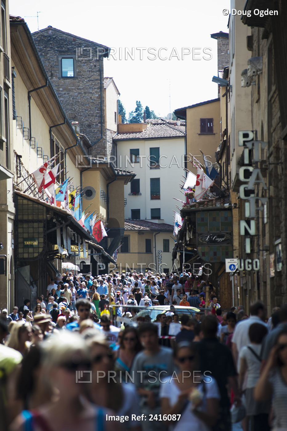 Crowds Of Tourists Near The Ponte Vecchio, Or Gold Bridge; Florence, Italy