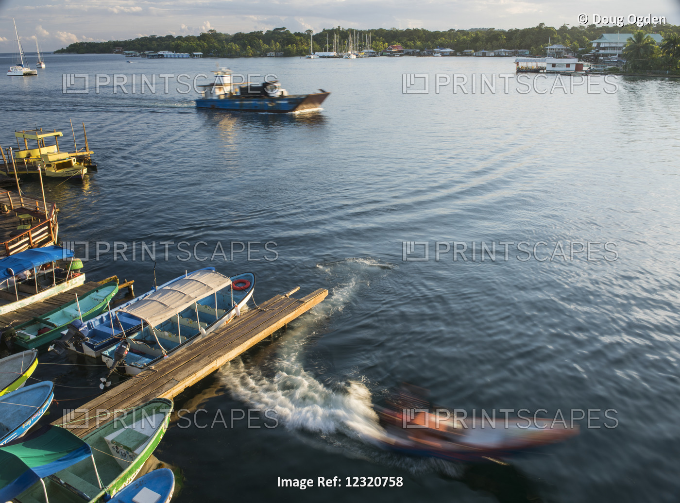 A Slow Exposure Of A Water Taxi Leaving The Dock And A Landing Craft Hauling A ...