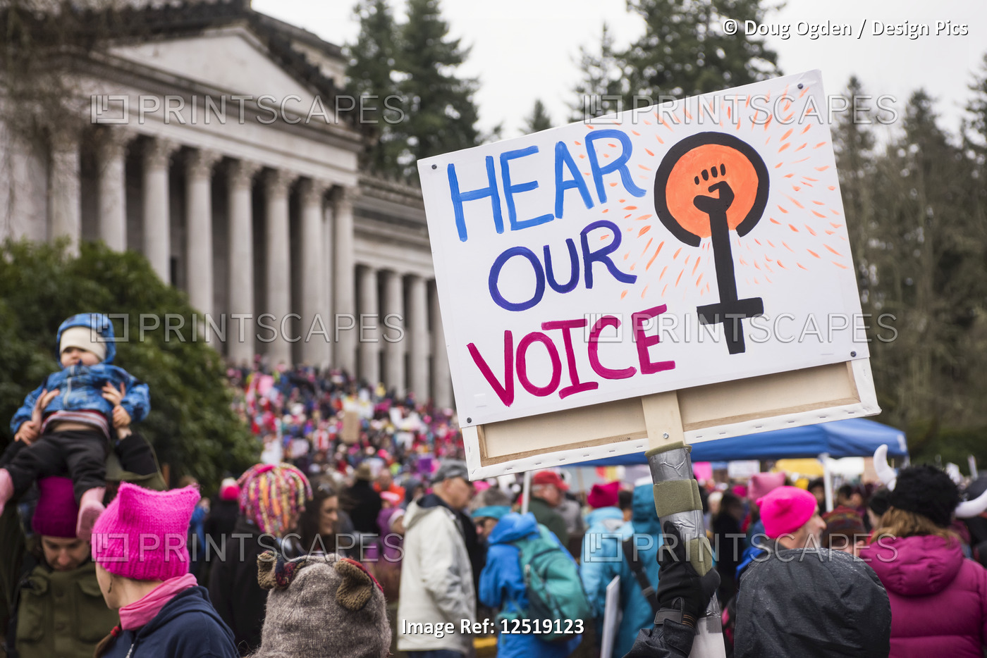 Protesters and sign at the 2018 Women's Day March in Olympia at the Washington ...