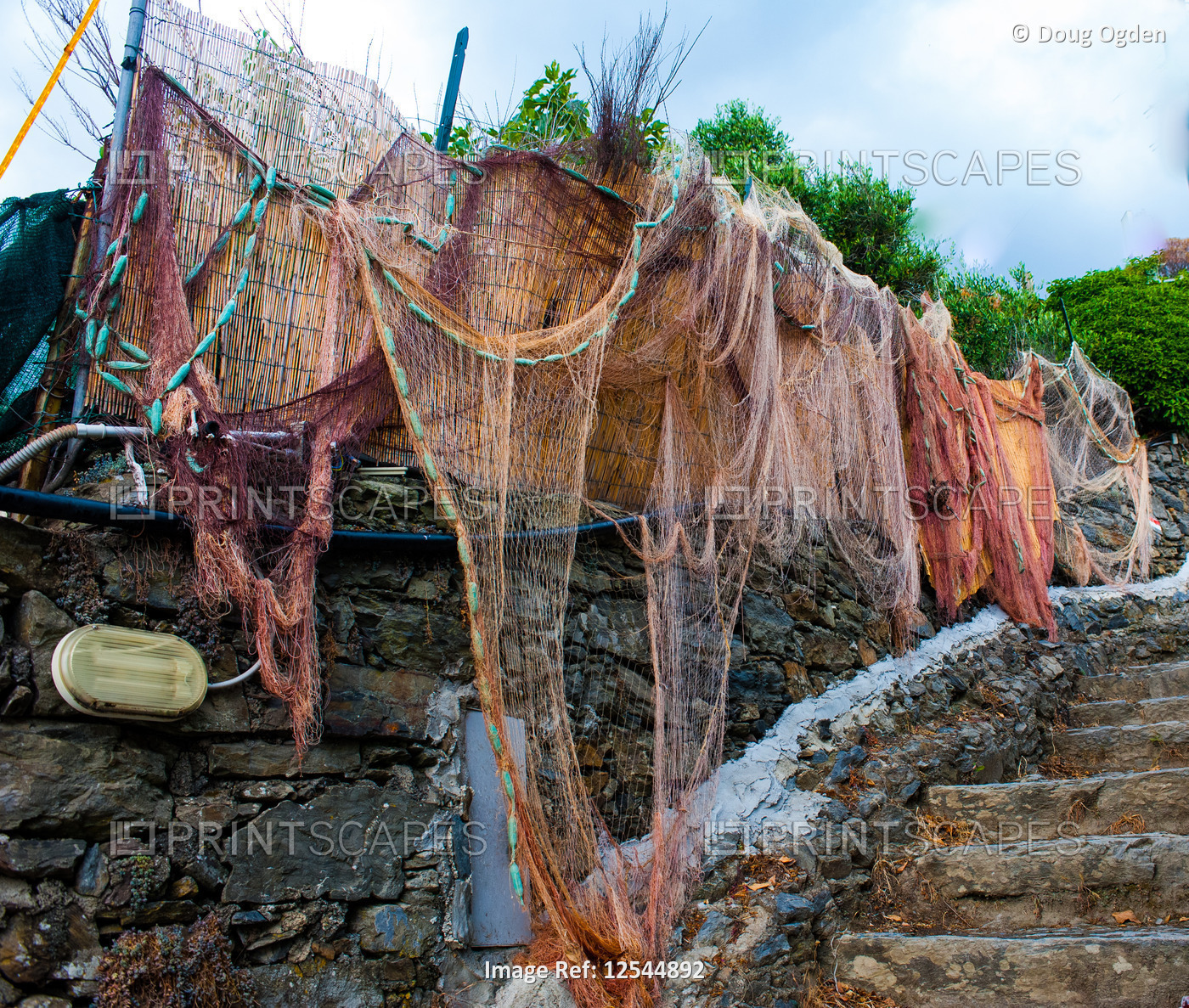 An old fishing net hung along the Cinqua Terra Trail in Italy