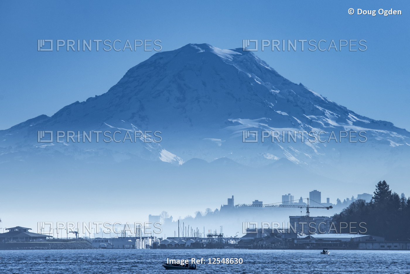 Mount Rainier looms over the city of Tacoma on an early winter morning; Tacoma, ...