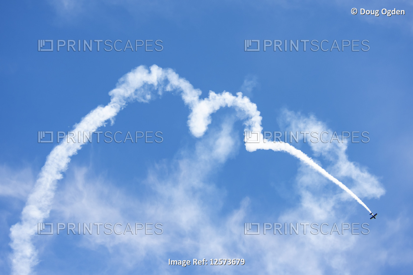 G-200 Airplane trailing smoke while performing aerobatic manoeuvres in the 2019 ...