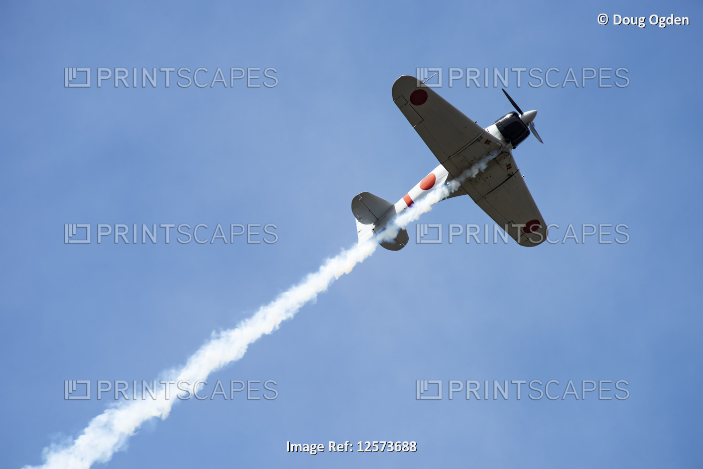 The Mitsubishi A6M "Tora" Zero, owned by the Olympic Flight Museum, trailing ...