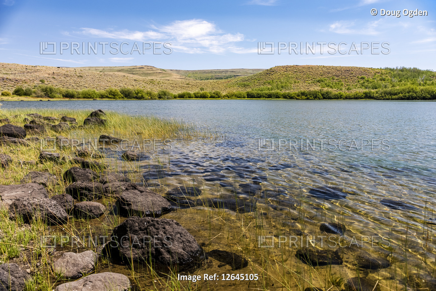 The clear waters of Pate Lake off the Steens Mountain Loop Road in Southeastern ...
