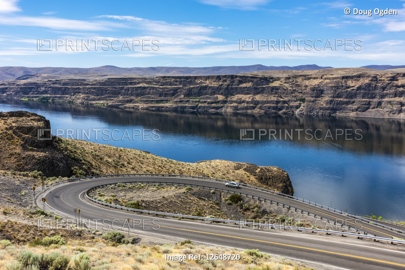 A switchback road leading to the town of Sunland, Washington on the bank of ...