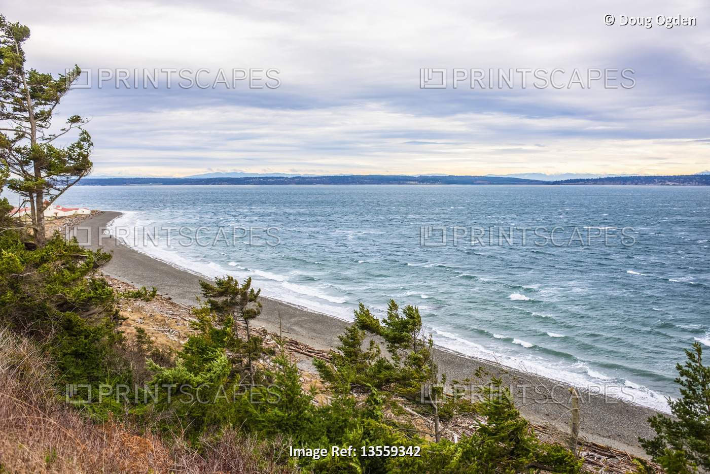 View from Marrowstone Island of the coastline and beach in the foreground; ...