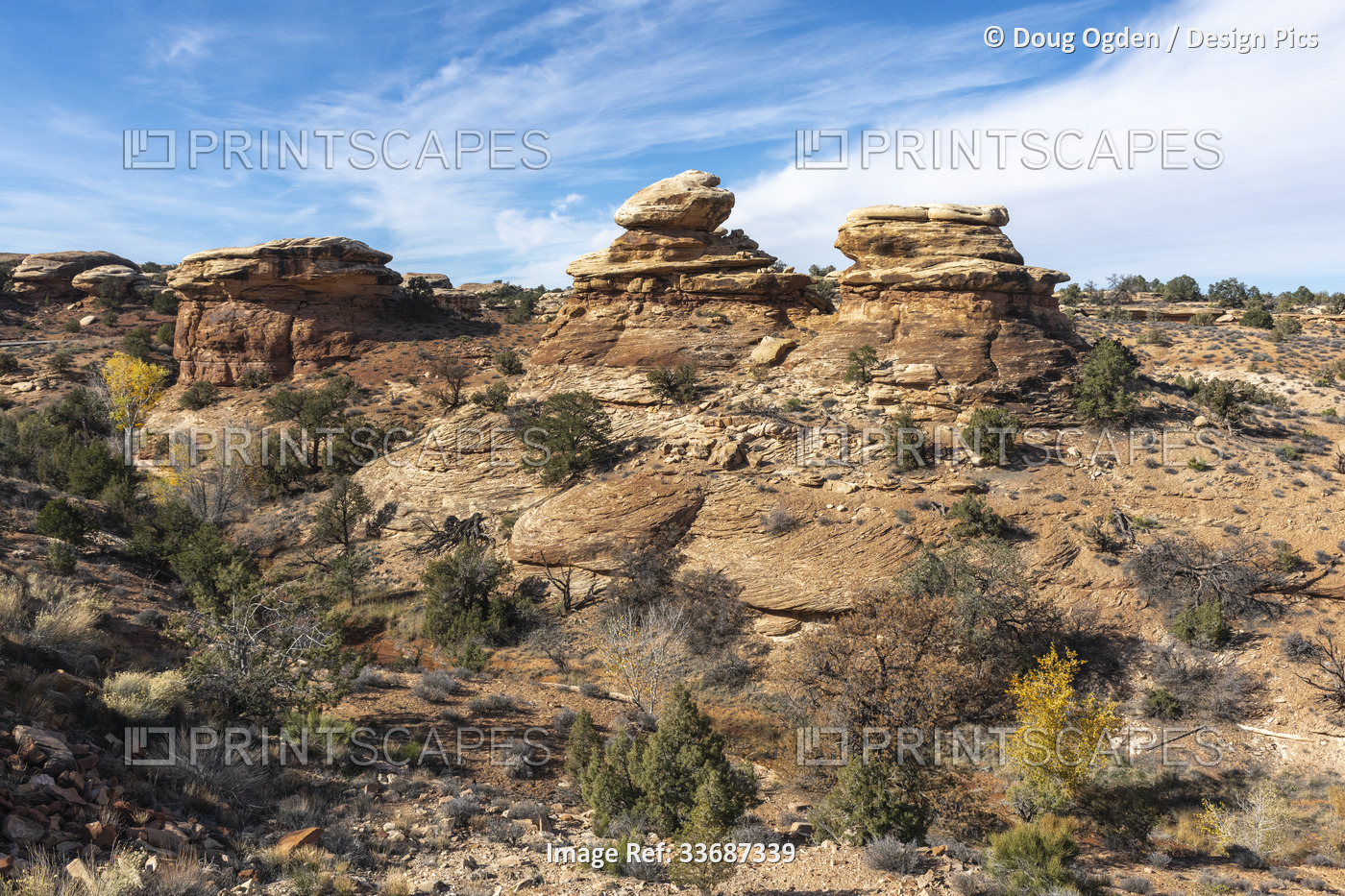Stacked rocks and flowing rock in Canyonlands National Park; Moab, Utah, United ...