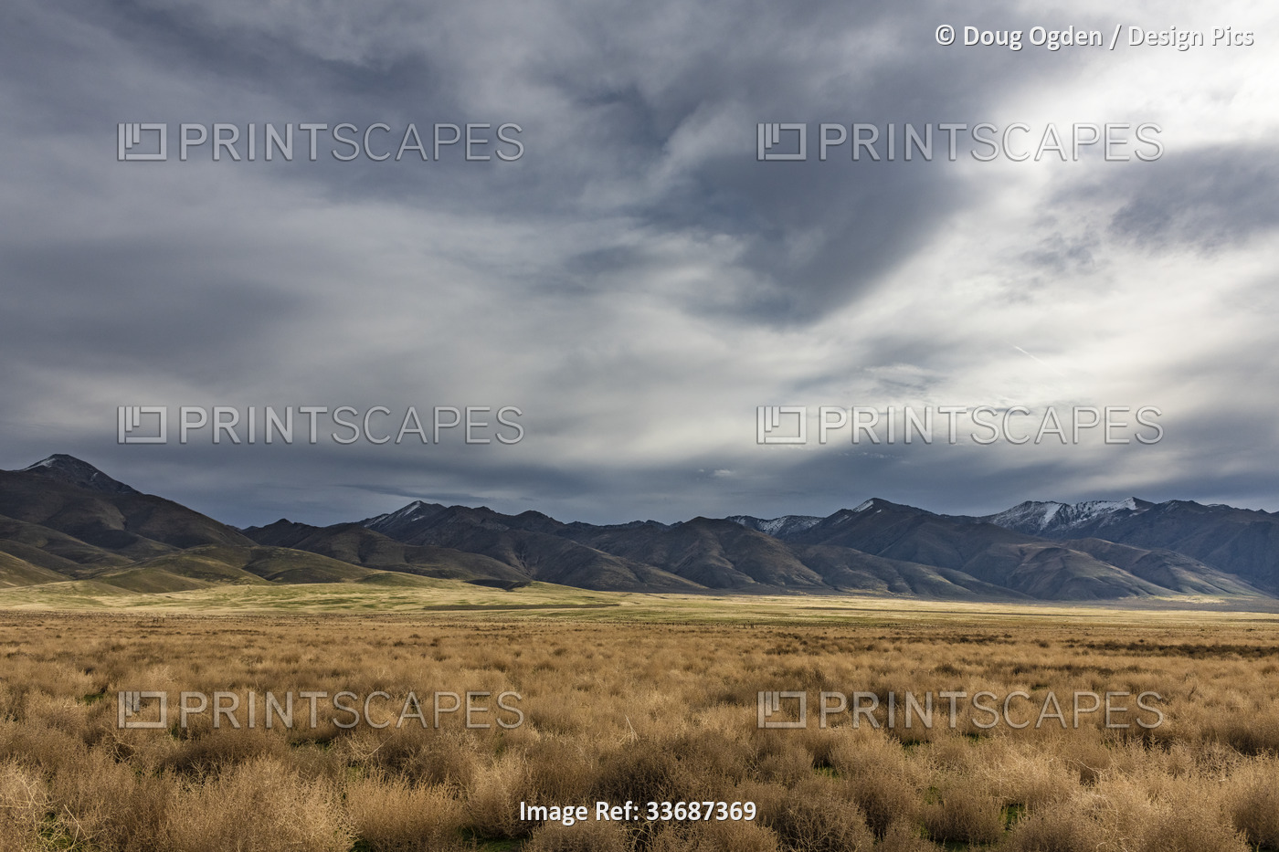 View of the surrounding mountains and threatening weather in Northern Nevada; ...