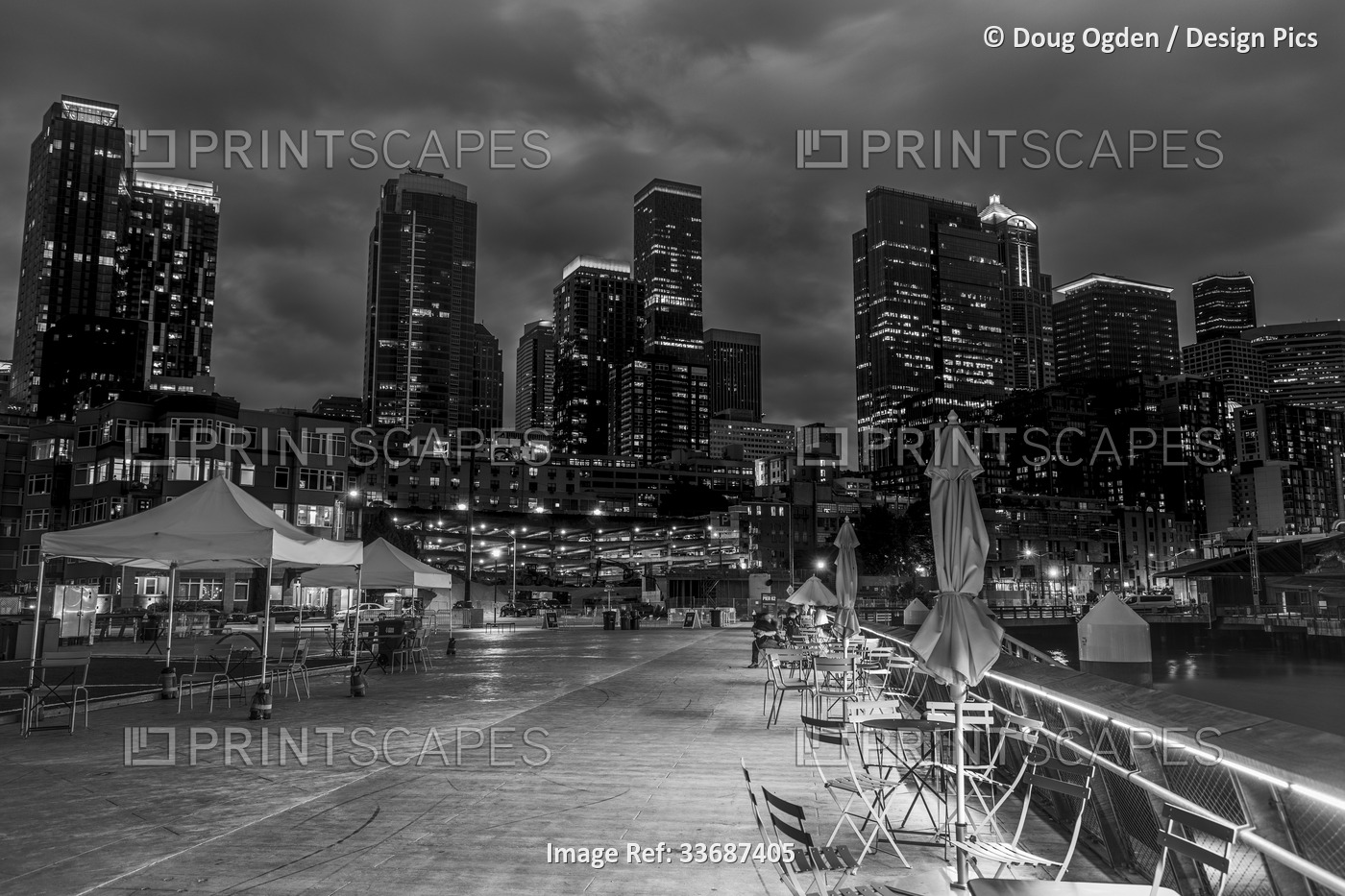 View of the Seattle skyline at night from Pier 62 in black and white; Seattle, ...