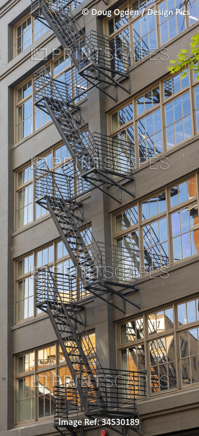 Fire escape stairs mounted to the outside of the Western Building in Downtown ...