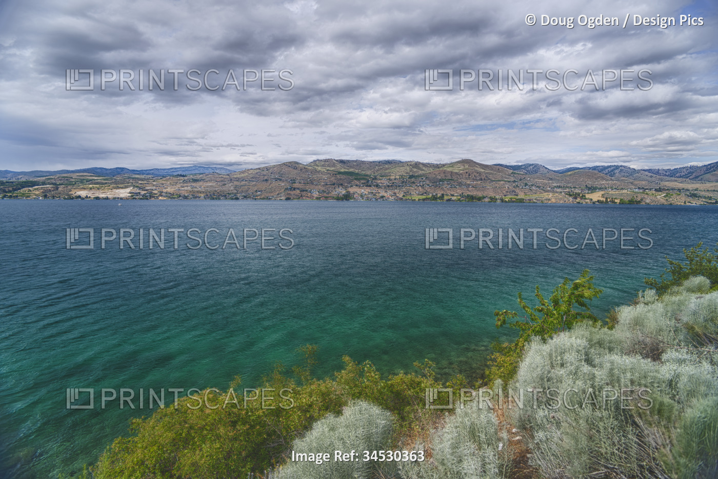 Beautiful clear waters of Lake Chelan on the east side of the Cascade Mountains ...